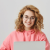 cute-freelance-girl-using-laptop-sitting-floor-smiling 1