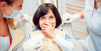 little-girl-dental-office-calm-happy 1